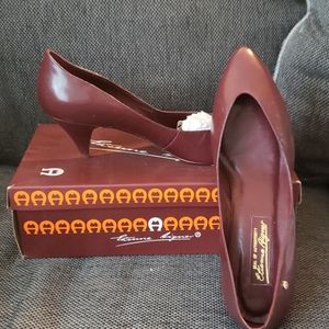 Maroon leather pumps